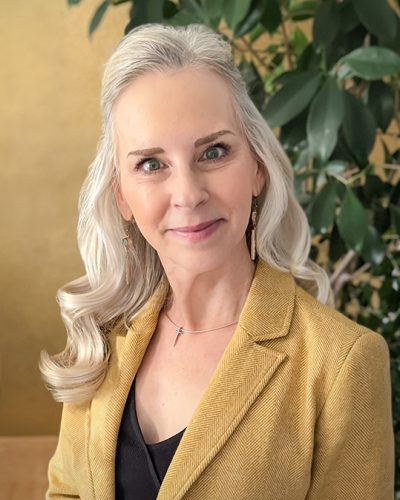 Susanne Golden jacket photo 2026_FINAL_Cropped_sm